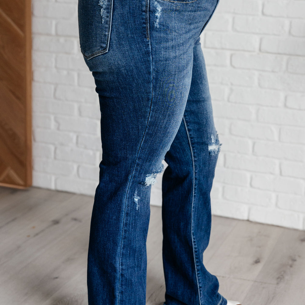 
                      
                        Mila Mid Rise Distressed Bootcut Jeans
                      
                    