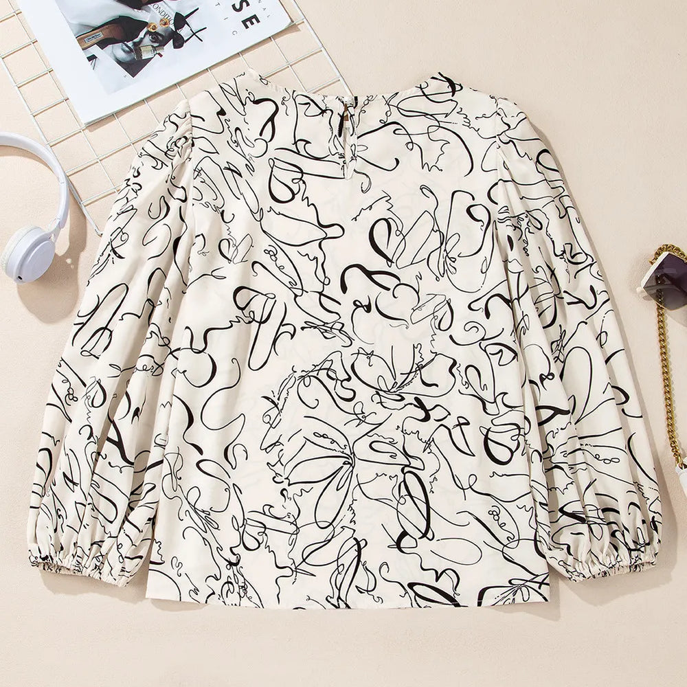 
                      
                        Printed Round Neck Three-Quarter Sleeve Blouse
                      
                    