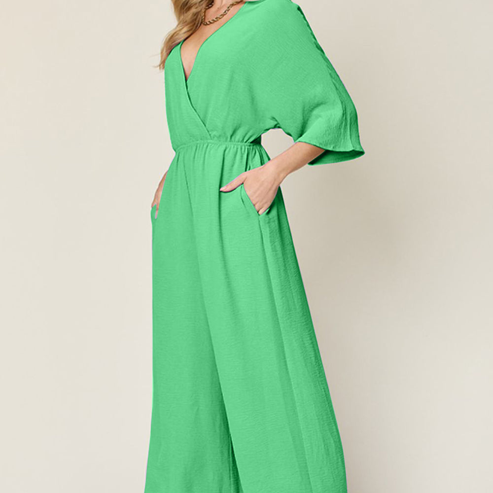 
                      
                        Double Take Full Size Surplice Wide Leg Jumpsuit with Pockets
                      
                    