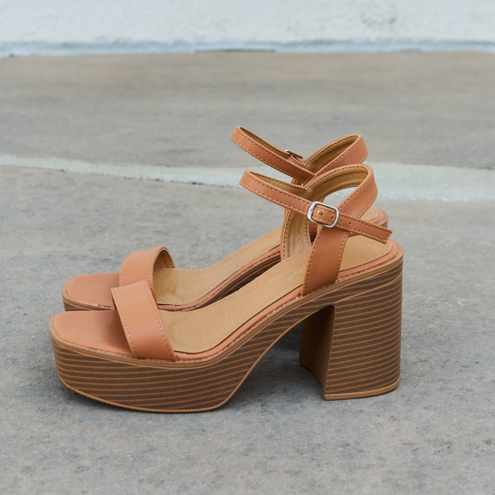 
                      
                        Weeboo Feel It Platform Heel Sandals
                      
                    