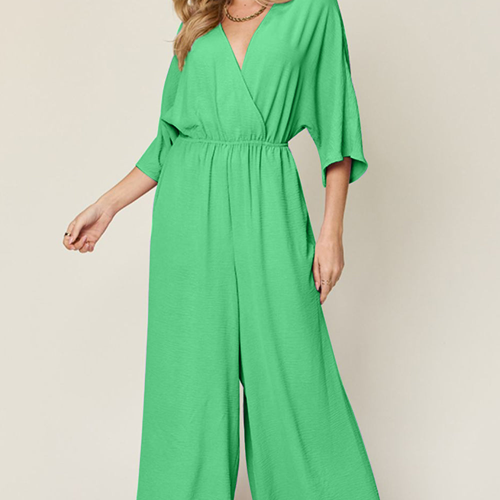 
                      
                        Double Take Full Size Surplice Wide Leg Jumpsuit with Pockets
                      
                    