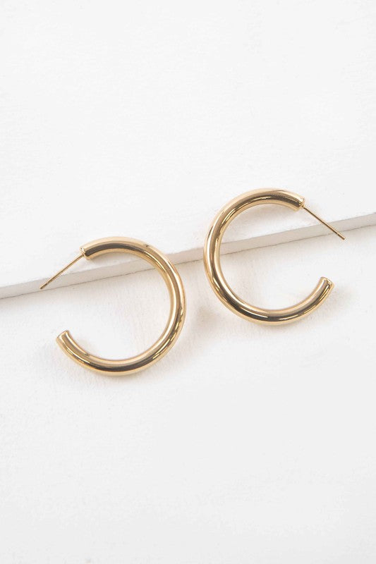 
                      
                        Canal Hoop Earrings
                      
                    