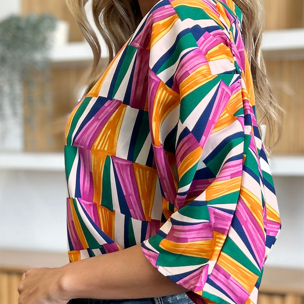 
                      
                        Double Take Full Size Geometric Notched Dolman Sleeve Top
                      
                    