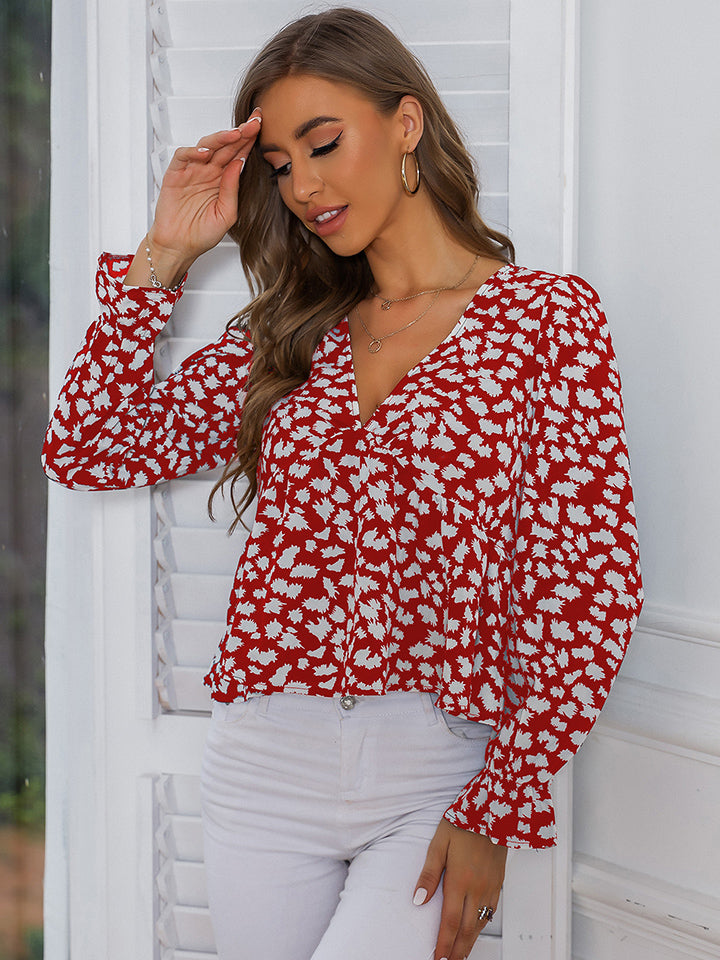 Honey Printed V-Neck Flounce Sleeve Blouse