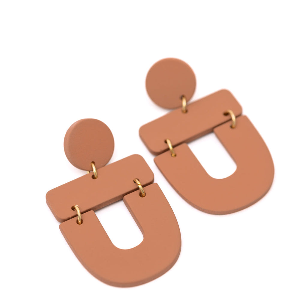 
                      
                        Dreamboat Earrings in Brown
                      
                    