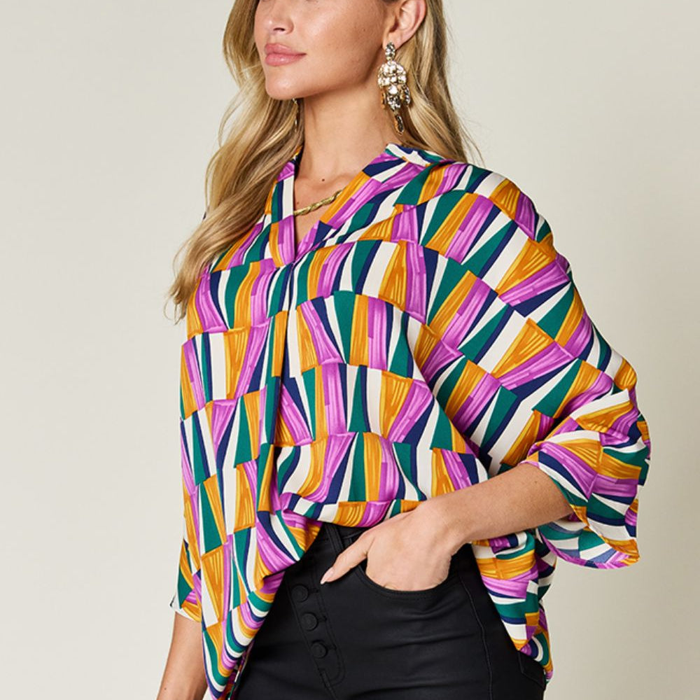 
                      
                        Double Take Full Size Geometric Notched Dolman Sleeve Top
                      
                    