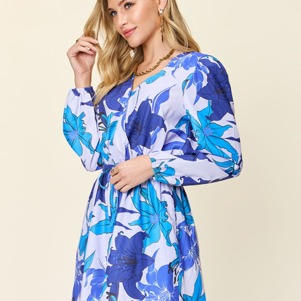 
                      
                        Double Take Full Size Floral Long Sleeve Romper with Pockets
                      
                    