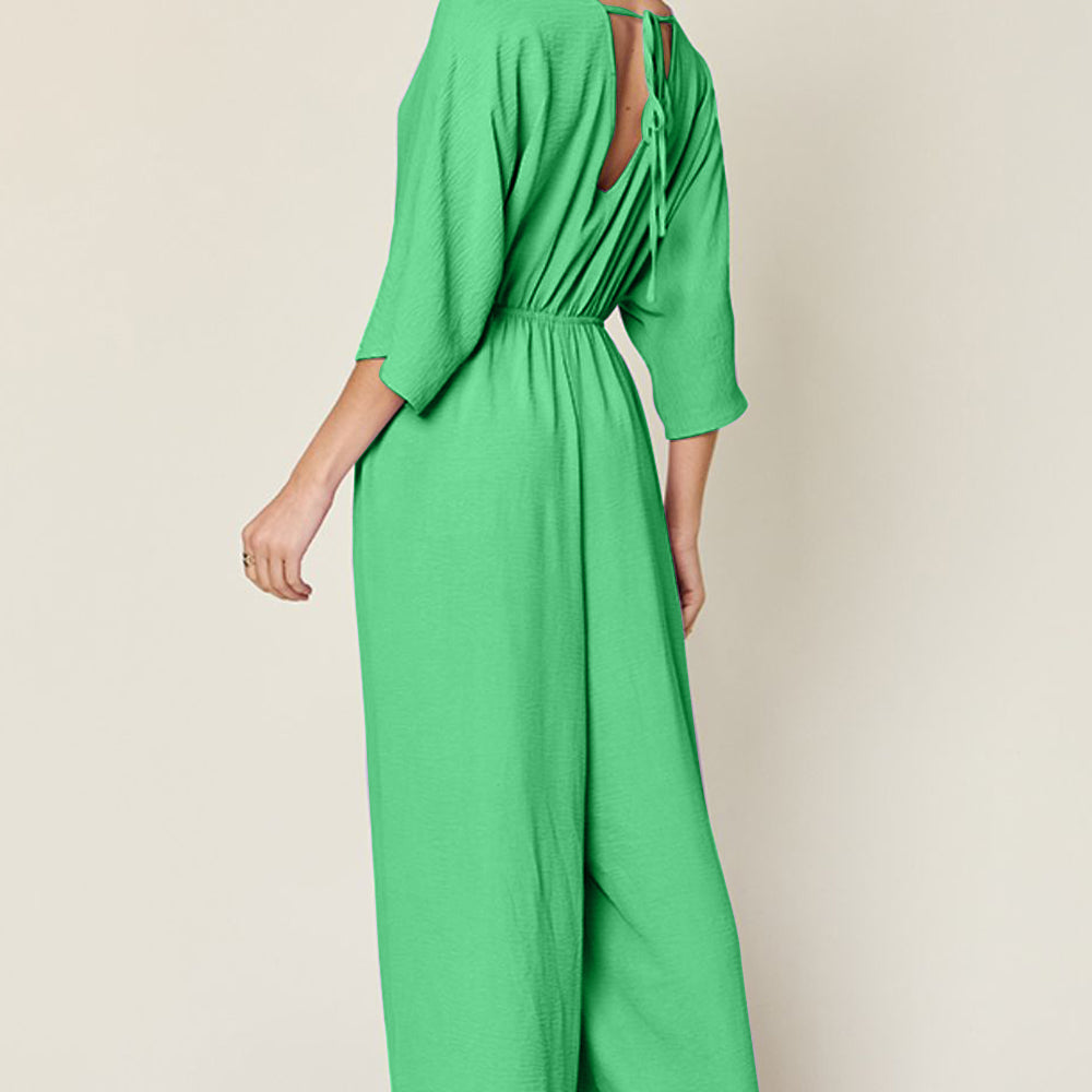 
                      
                        Double Take Full Size Surplice Wide Leg Jumpsuit with Pockets
                      
                    