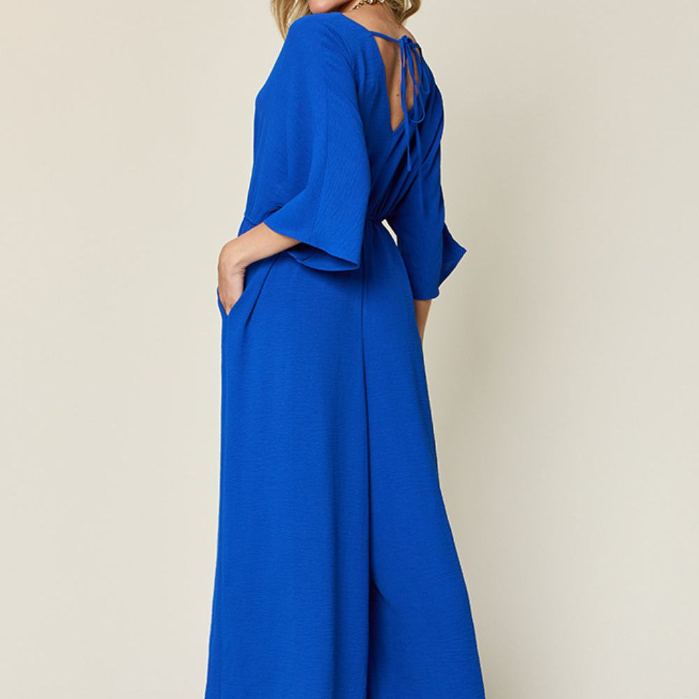 
                      
                        Double Take Full Size Surplice Wide Leg Jumpsuit with Pockets
                      
                    