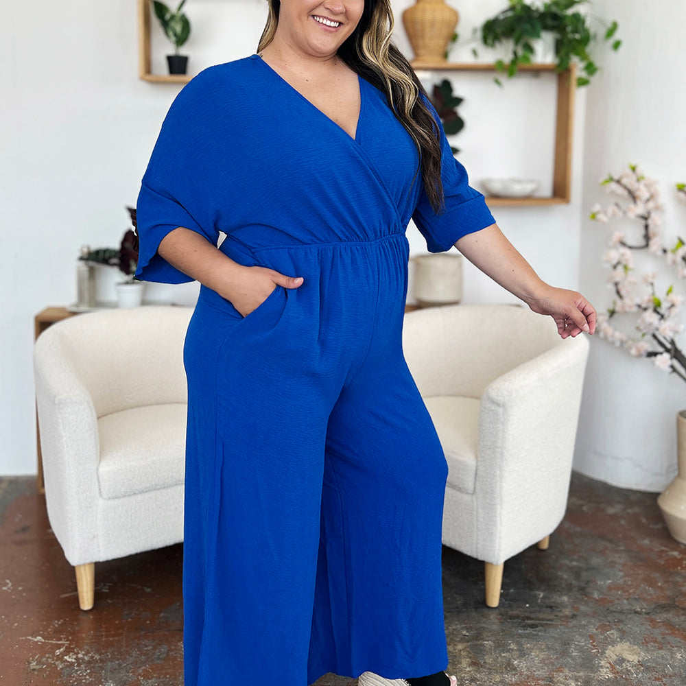 
                      
                        Double Take Full Size Surplice Wide Leg Jumpsuit with Pockets
                      
                    