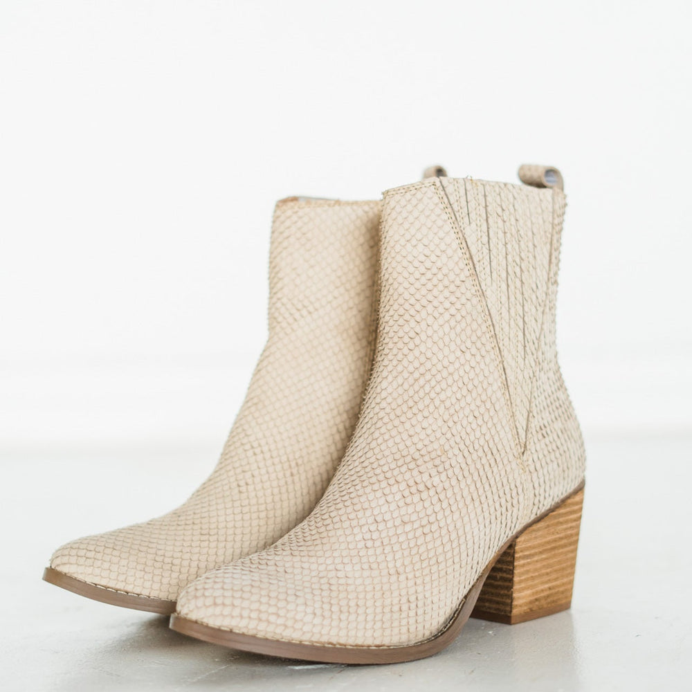 
                      
                        Taris Ankle Boot in Cream
                      
                    