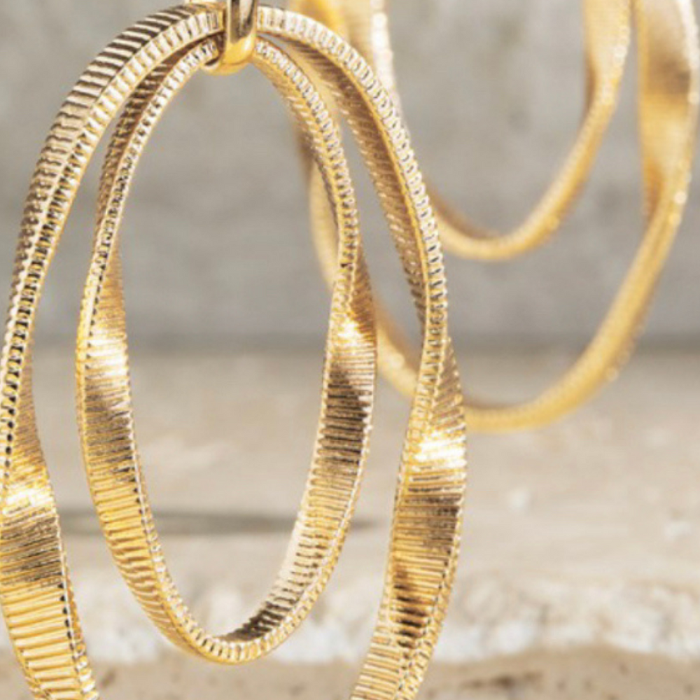 
                  
                    gold dangled earrings
                  
                