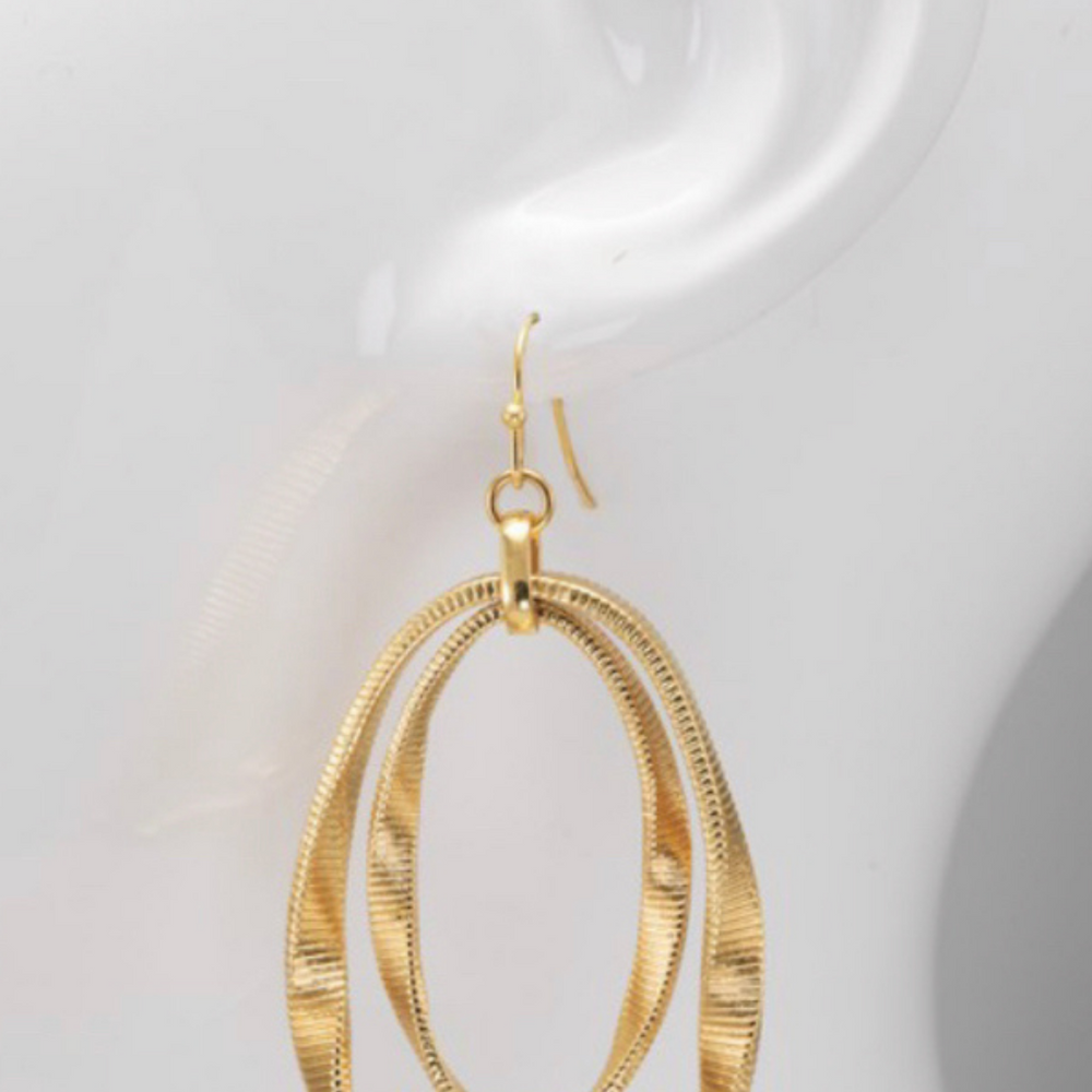 
                  
                    gold dangled earrings
                  
                